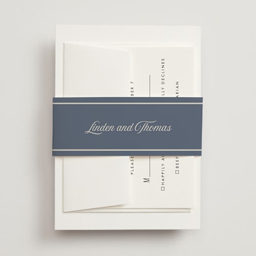 This is a french blue belly bands with standard by Nicoletta Savod called ritzy printing on signature text in belly band