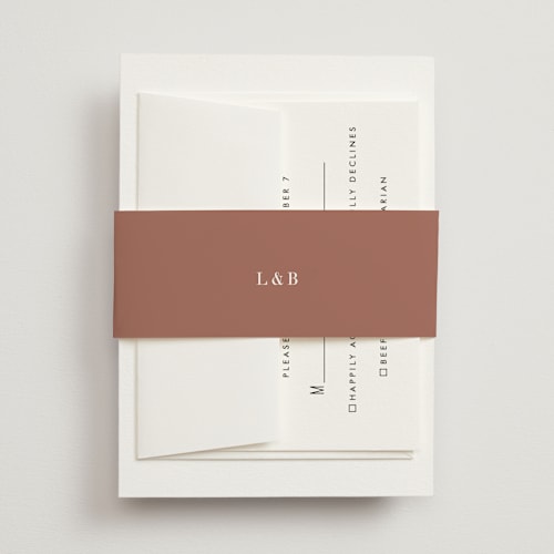 This is a blush belly bands with standard by Megan Davis called charleston printing on signature text in belly band