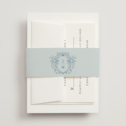 This is a dusty blue belly bands with standard by Jennifer Postorino called empire printing on signature text in belly band