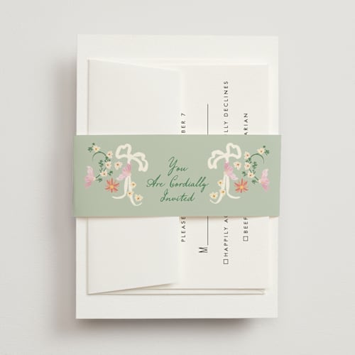 This is a spring belly bands with standard by Phrosné Barwood called spring draped garland printing on signature text in belly band