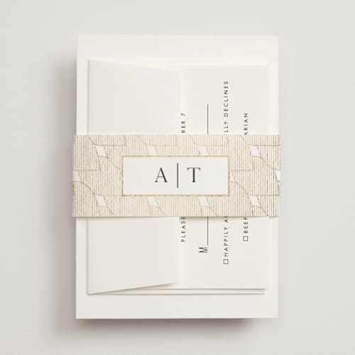 This is a marshmallow belly bands with foil pressed by Kaydi Bishop called the wedding printing on signature text in belly band