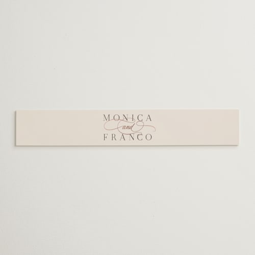 This is a cream belly bands with foil pressed by Hooray Creative called and centered printing on signature text in belly band