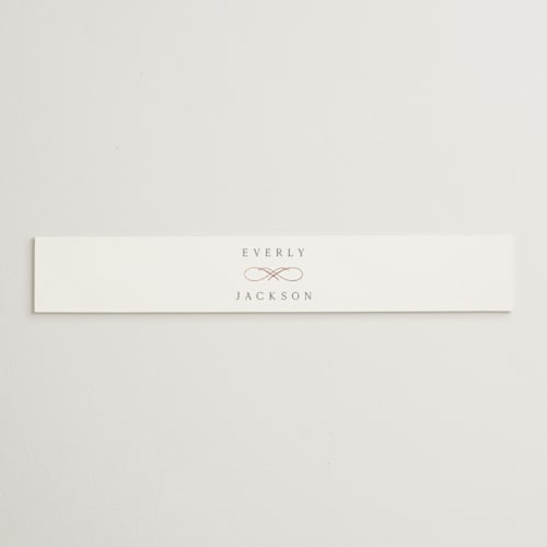 This is a snow belly bands with foil pressed by Kaydi Bishop called eternal printing on signature text in belly band
