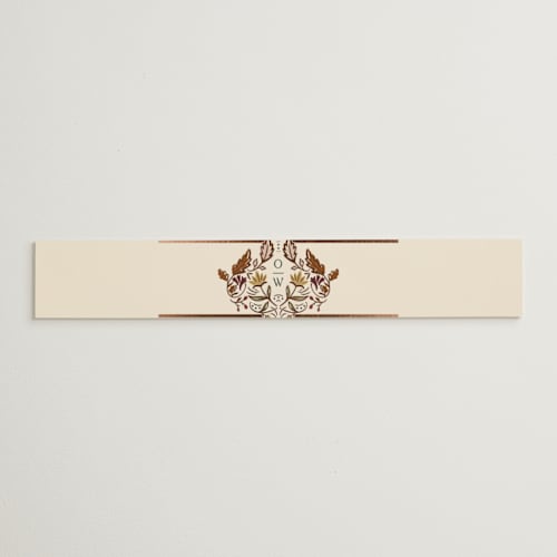This is a deep sea belly bands with foil pressed by Erin German called autumnal arch printing on signature text in belly band