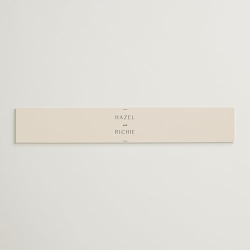 This is a linen belly bands with foil pressed by Blustery August called walnut printing on signature text in belly band