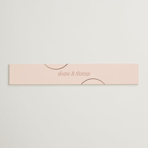 This is a clay belly bands with foil pressed by Morgan Kendall called unity printing on signature text in belly band