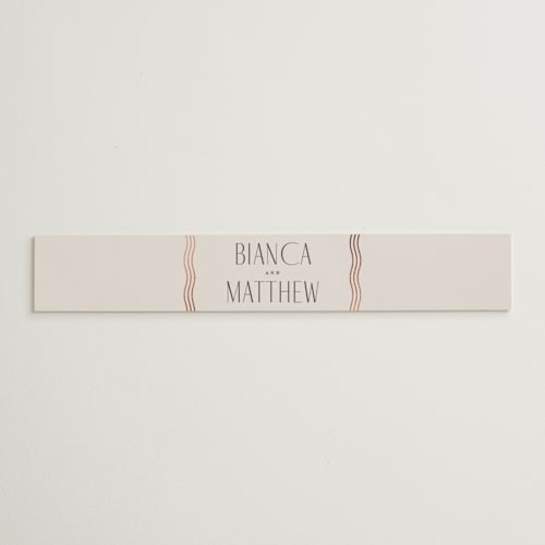 This is a bisque belly bands with foil pressed by Kristie Kern called newberry printing on signature text in belly band