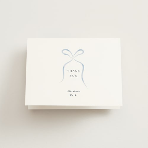 This is a dusty blue bridal shower thank you cards with standard by Corinne Malesic called bow printing on strathmore in standard