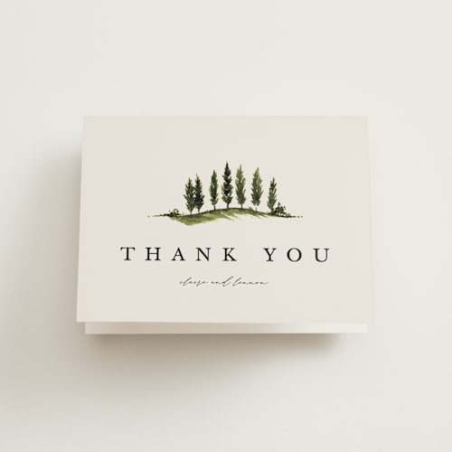 This is a creme wedding thank you cards with standard by Kate Ahn called tuscan hill printing on strathmore in standard