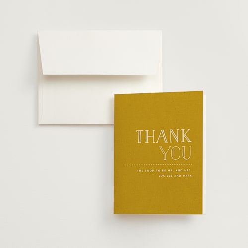This is a brass wedding thank you cards with standard by Roxy Cervantes called golden ticket printing on strathmore in standard