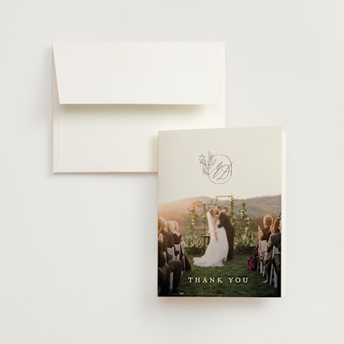 This is a blush wedding thank you cards with standard by Lucrecia Caporale called delicate monogram printing on strathmore in standard