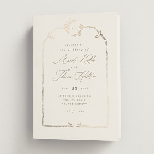 This is a porcelain unique wedding programs with foil pressed by Leah Bisch called reflection printing on signature in folded