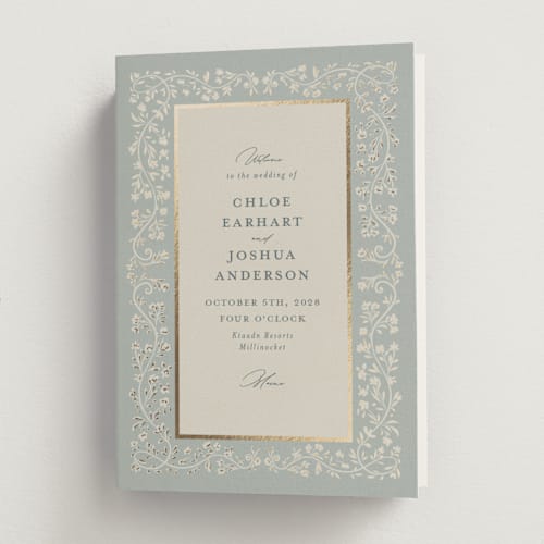 This is a something blue unique wedding programs with foil pressed by Gwen Bedat called floral romance printing on signature in folded
