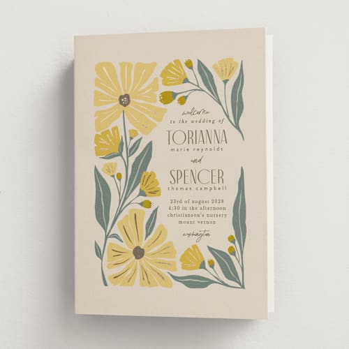 This is a buttercup unique wedding programs with foil pressed by Karidy Walker called storybook garden printing on signature in folded