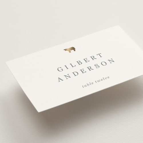 This is a ivory wedding place cards with foil pressed by Sierra Lee called noted printing on signature in placecard