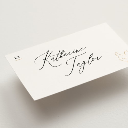 This is a ivory wedding place cards with foil pressed by Creo Study called gilded icons printing on signature in placecard
