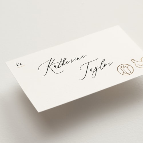 This is a ivory wedding place cards with foil pressed by Creo Study called gilded icons printing on signature in placecard