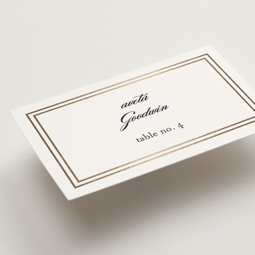 This is a snow wedding place cards with foil pressed by Kimberly FitzSimons called eloquence printing on signature in placecard