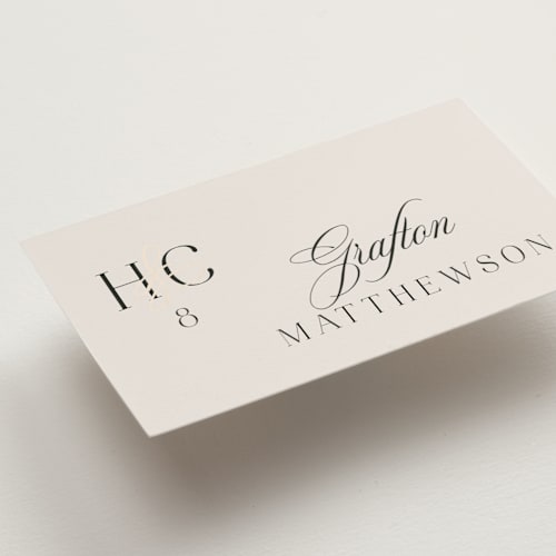 This is a ivory wedding place cards with foil pressed by Melanie Kosuge called honor printing on signature in placecard