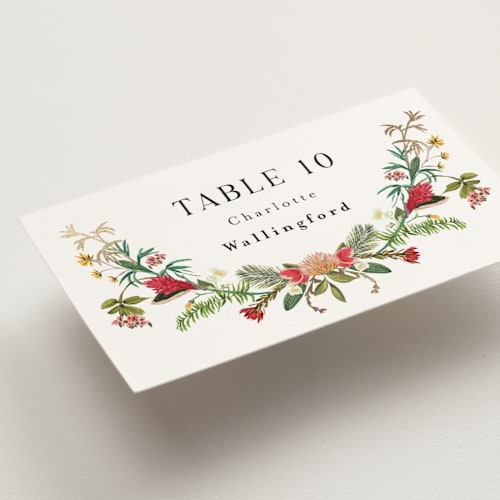 This is a papaya wedding place cards with foil pressed by Susan Moyal called tropica printing on signature in placecard