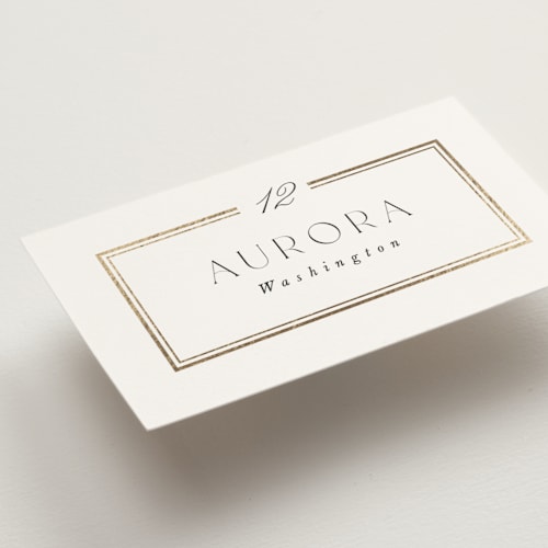 This is a pearl wedding place cards with foil pressed by Leah Bisch called elegant type printing on signature in placecard