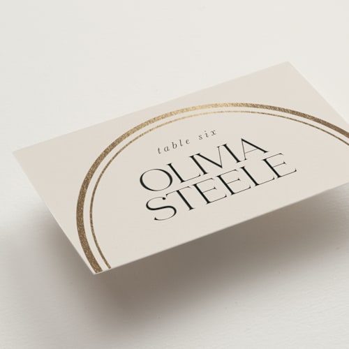 This is a sandstone wedding place cards with foil pressed by Lori Wemple called oval printing on signature in placecard