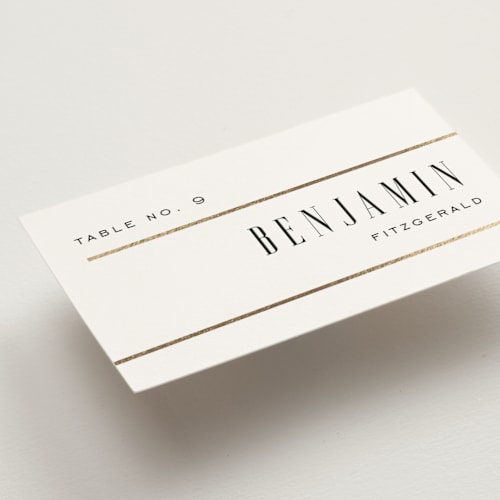 This is a lily wedding place cards with foil pressed by Heather Schertzer called documentary printing on signature in placecard