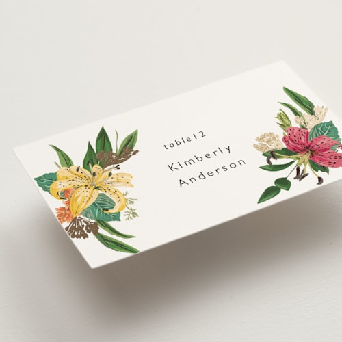 This is a tropical wedding place cards with foil pressed by Susan Moyal called delicate printing on signature in placecard