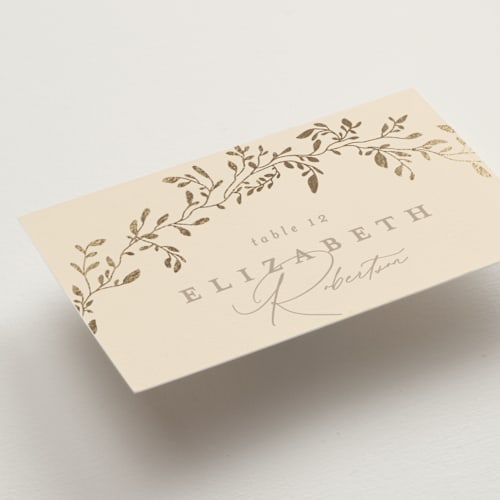 This is a sand wedding place cards with foil pressed by Creo Study called leafy garland printing on signature in placecard