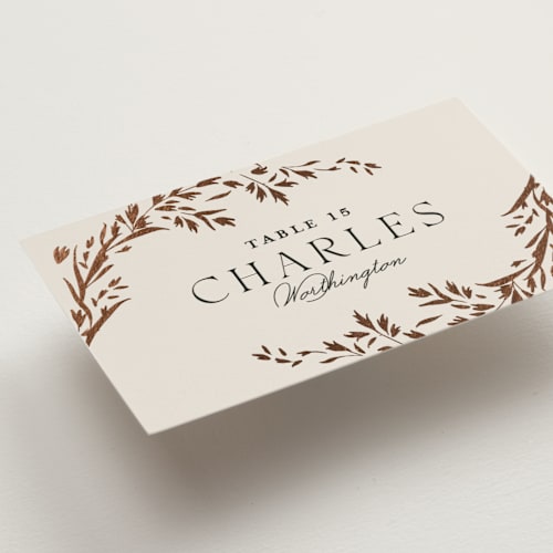 This is a almond wedding place cards with foil pressed by Erin L. Wilson called trailing vines printing on signature in placecard