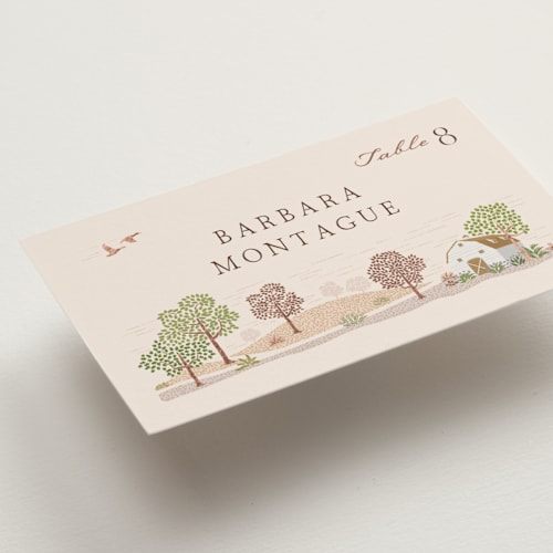This is a rose quartz wedding place cards with foil pressed by Paper Sun Studio called countryside printing on signature in placecard