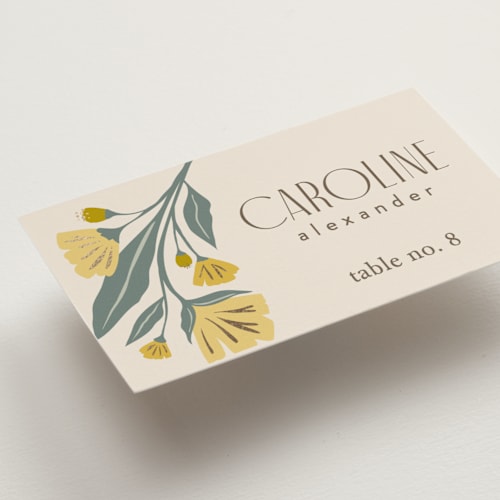 This is a buttercup wedding place cards with foil pressed by Karidy Walker called storybook garden printing on signature in placecard