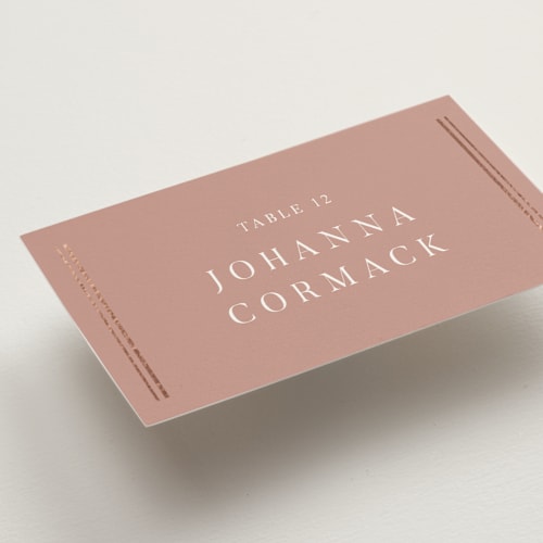 This is a rose wedding place cards with foil pressed by Nicole Walsh called classic elegance printing on signature in placecard