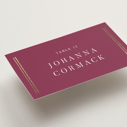 This is a berry wedding place cards with foil pressed by Nicole Walsh called classic elegance printing on signature in placecard