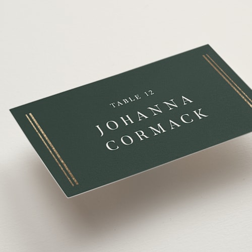 This is a forest wedding place cards with foil pressed by Nicole Walsh called classic elegance printing on signature in placecard