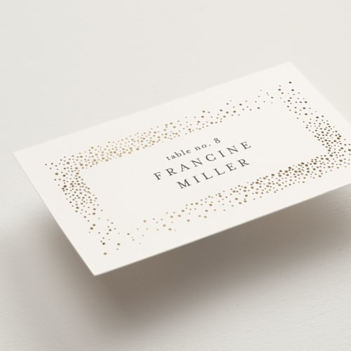 This is a sparkle wedding place cards with foil pressed by Pixel and Hank called flicker printing on signature in placecard