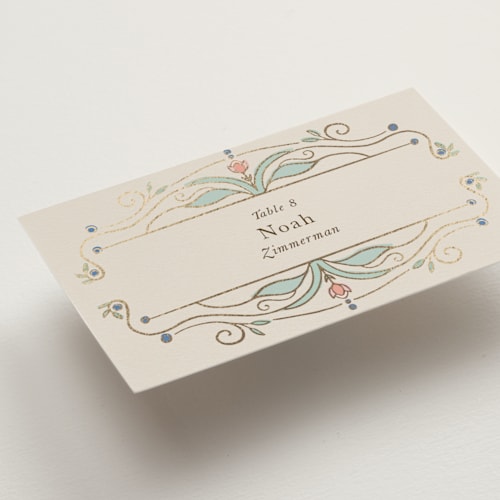 This is a ivory wedding place cards with foil pressed by Maria Hilas-Louie called ornate elegance printing on signature in placecard