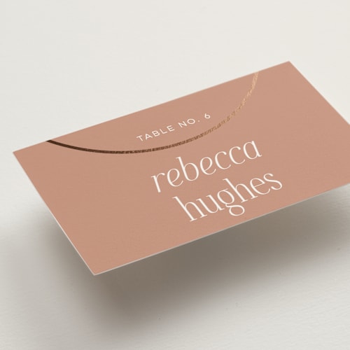 This is a clay wedding place cards with foil pressed by Morgan Kendall called unity printing on signature in placecard