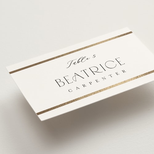 This is a cotton wedding place cards with foil pressed by Stacey Meacham called luster printing on signature in placecard