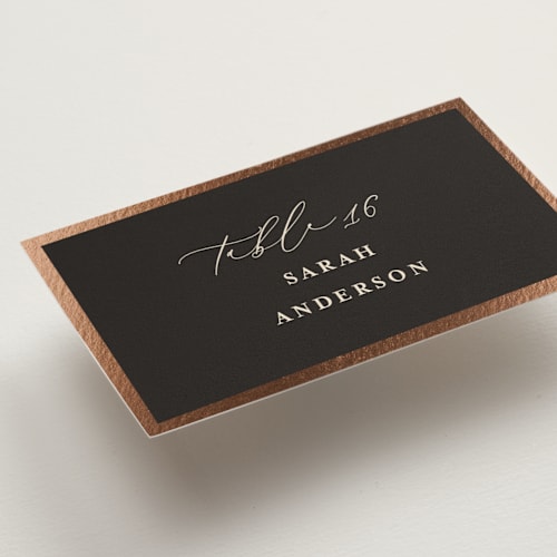 This is a burnt sienna wedding place cards with foil pressed by Susan Moyal called classic love printing on signature in placecard