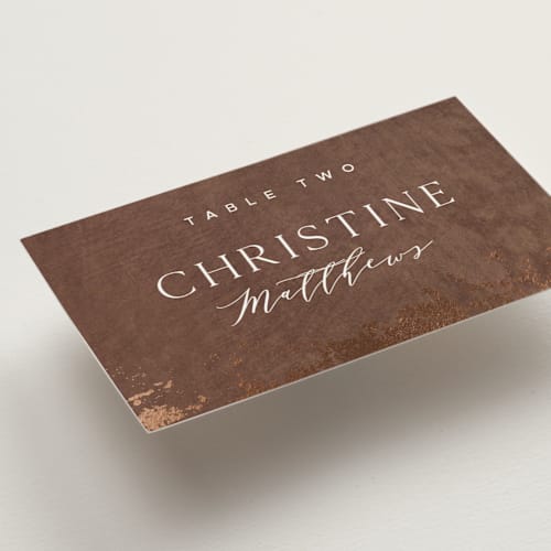 This is a copper wedding place cards with foil pressed by Eric Clegg called woodland hills printing on signature in placecard