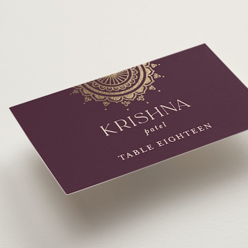 This is a plum wedding place cards with foil pressed by Randi Cirelli called arunima printing on signature in placecard