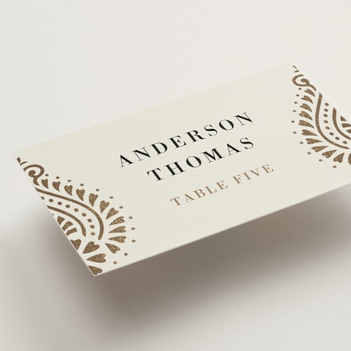 This is a champagne wedding place cards with foil pressed by Oma N. Ramkhelawan called henna stamp printing on signature in placecard