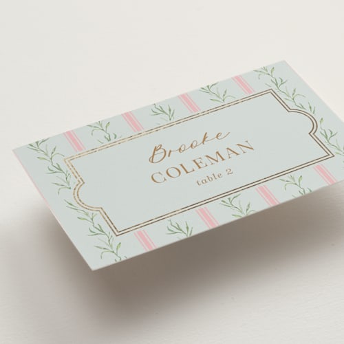 This is a hummingbird wedding place cards with foil pressed by Claudia Orengo called castle printing on signature in placecard