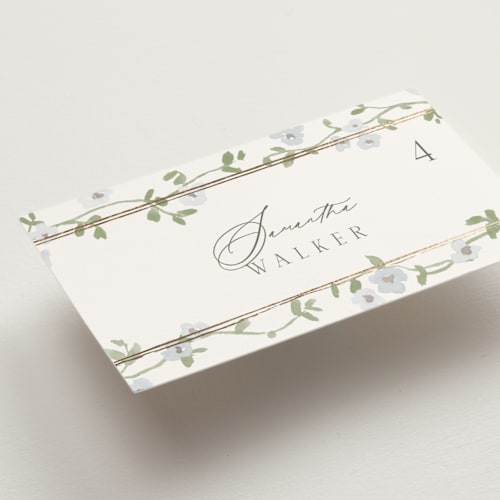 This is a blue bell wedding place cards with foil pressed by Everett Paper Goods called portico printing on signature in placecard