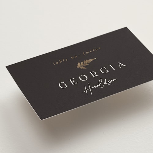 This is a mahogany wedding place cards with foil pressed by Leah Bisch called garden printing on signature in placecard