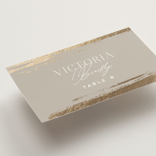 This is a clay wedding place cards with foil pressed by Carolyn Nicks called true love printing on signature in placecard
