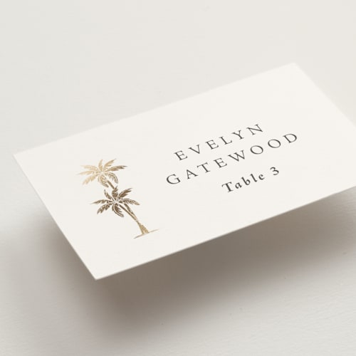 This is a stone wedding place cards with foil pressed by Olivia Raufman called palm monogram printing on signature in placecard