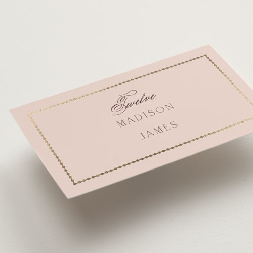 This is a rose quartz wedding place cards with foil pressed by Emily Betts called scallop monogram printing on signature in placecard
