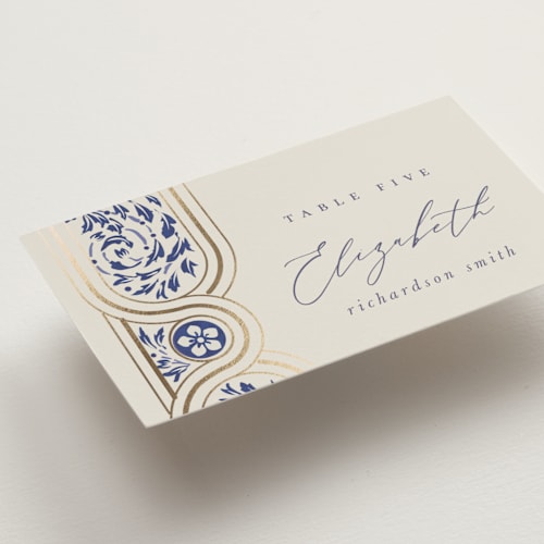This is a dynasty blue wedding place cards with foil pressed by Ana de Sousa called tiled romance printing on signature in placecard